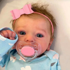 Bebê Reborn de Silicone Júlia Cheirinho Suave e Toque Natural